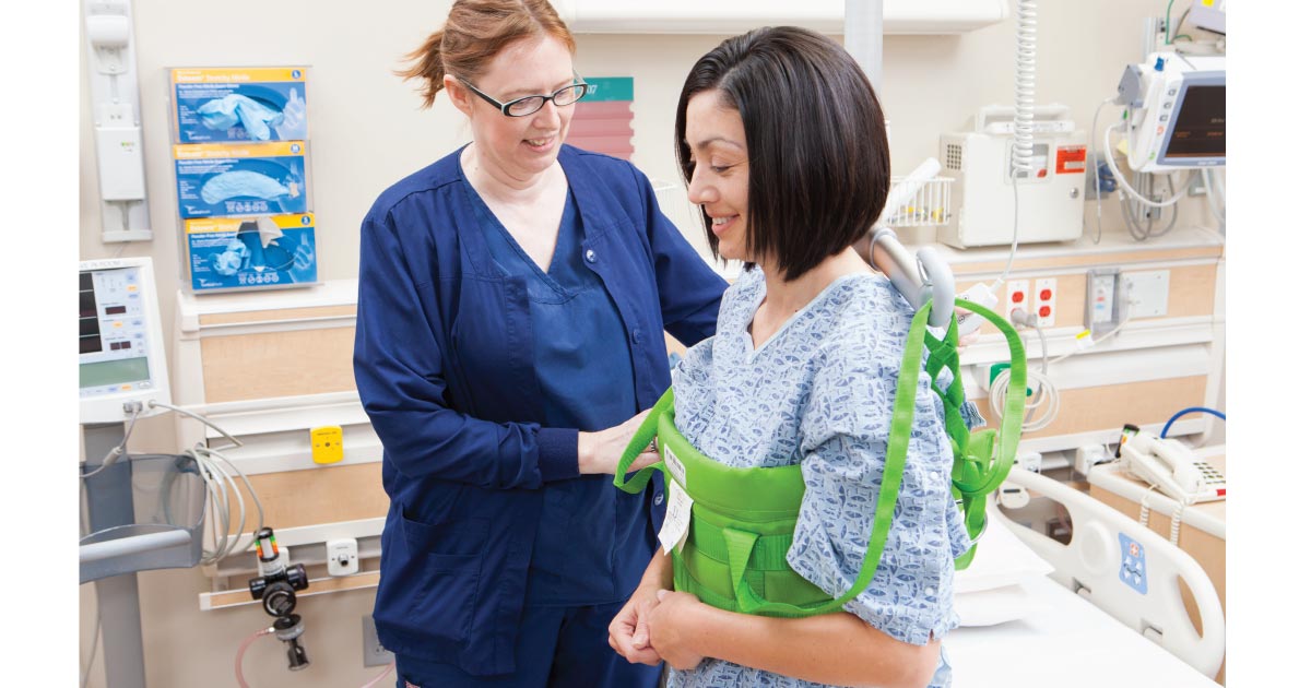 nurse helping woman with exercise after epilepsy surgery