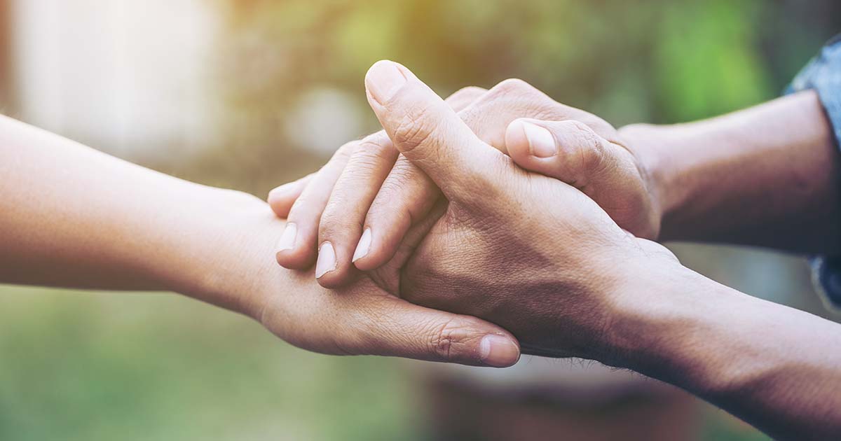 holding-hands-AdobeStock
